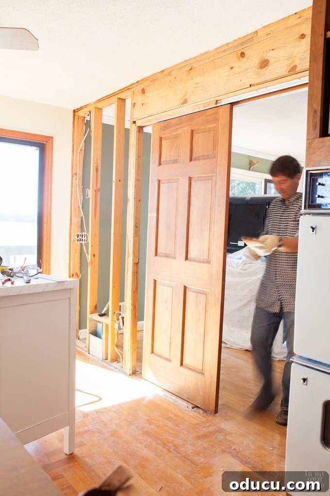 Lake House Living A DIY First Year 23 How to remove a wall and expertly repair the flooring gap