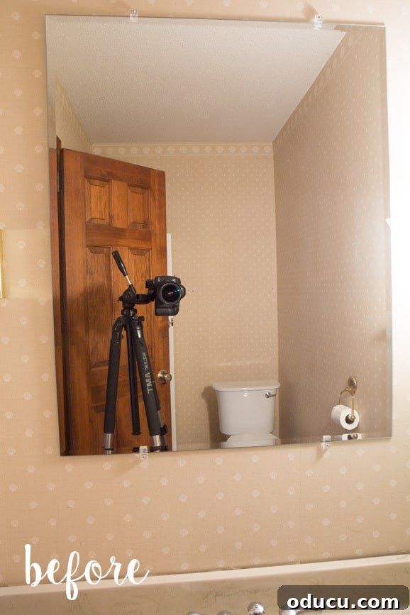 Lake House Living A DIY First Year 32 Bathroom makeover ideas to DIY, focusing on painting wallpaper