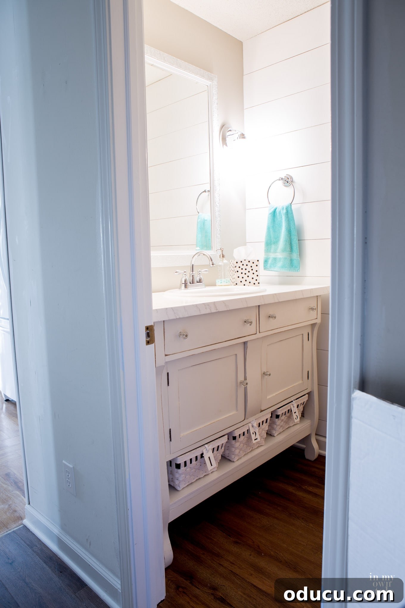 Lake House Living A DIY First Year 33 Budget-friendly bathroom makeover showcasing a light and bright transformation