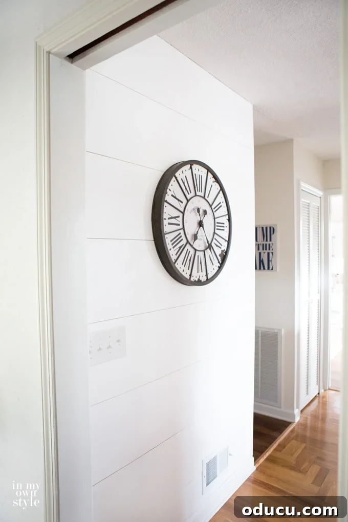 Lake House Living A DIY First Year 35 Shiplap wood plank wall tutorial showcasing a lake house accent wall