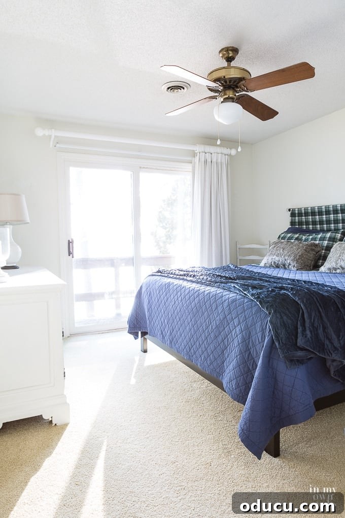 Easy DIY Headboard for Your Guest Space 2 Easy and affordable DIY headboard made with a bed sheet for a guest room