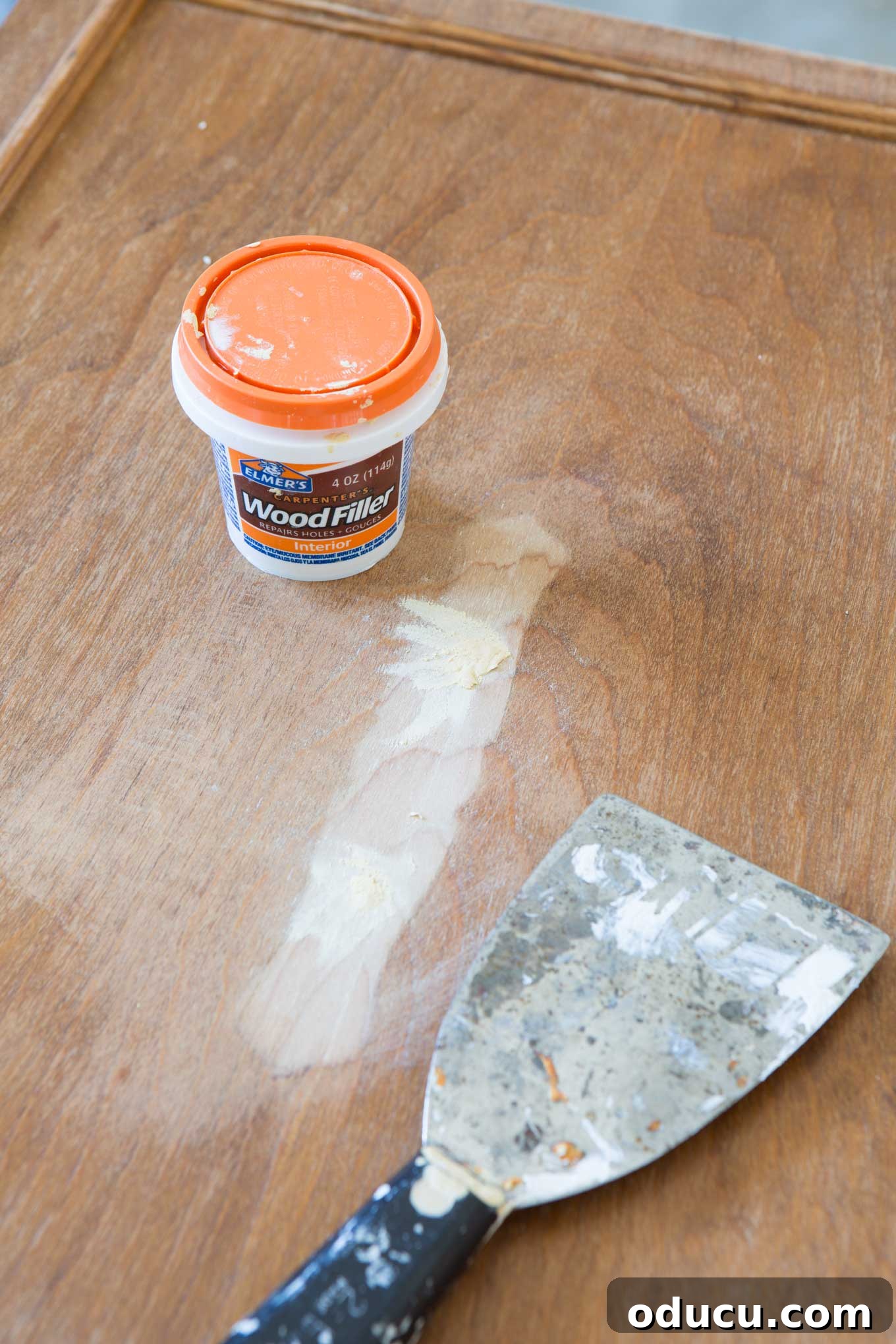 Flawless Cabinet Painting: Your Guide to a Factory-Smooth Finish 19 How-to-fill-holes-on-kitchen-cabients