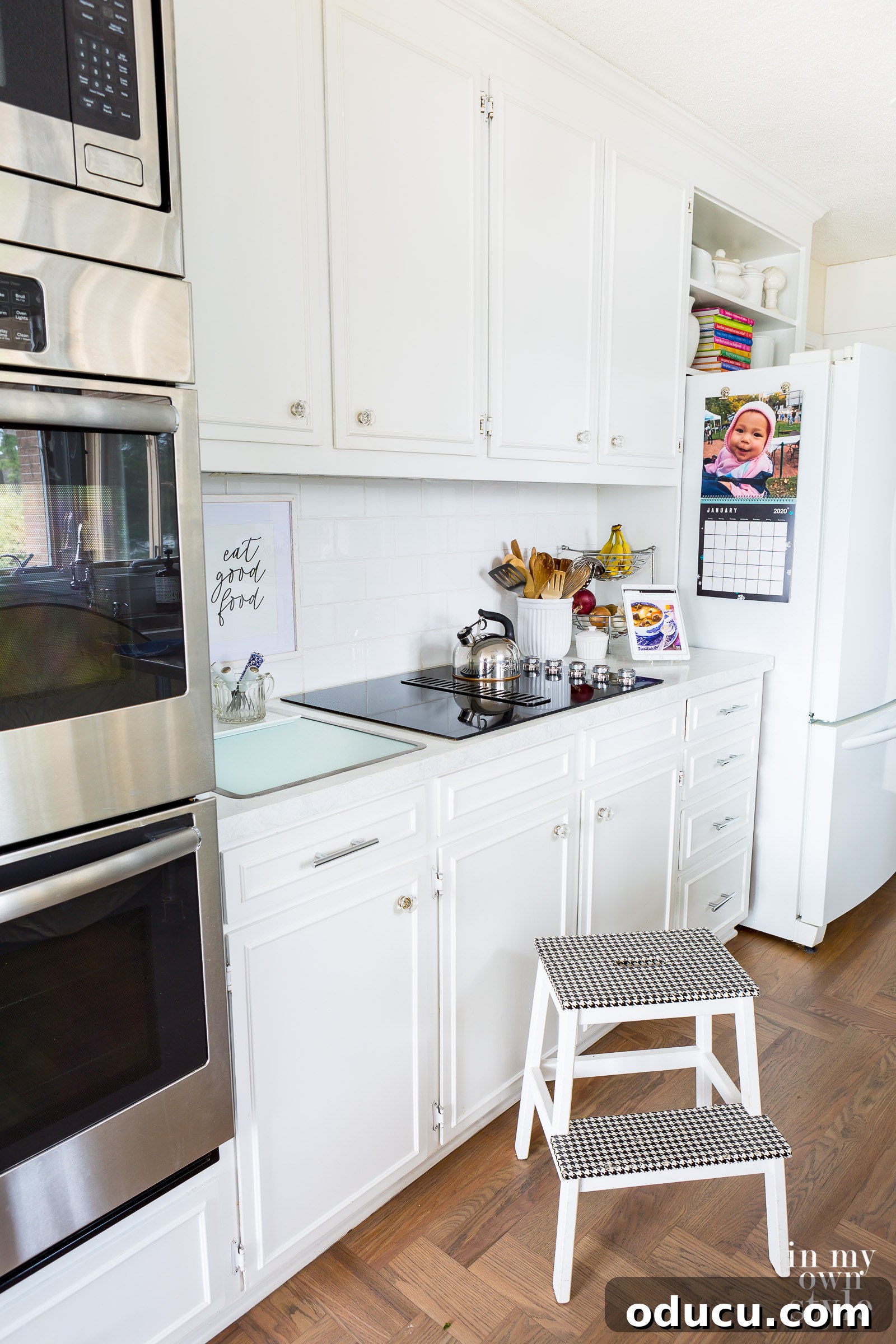 Flawless Cabinet Painting: Your Guide to a Factory-Smooth Finish 29 White Kitchen with hardwood floor