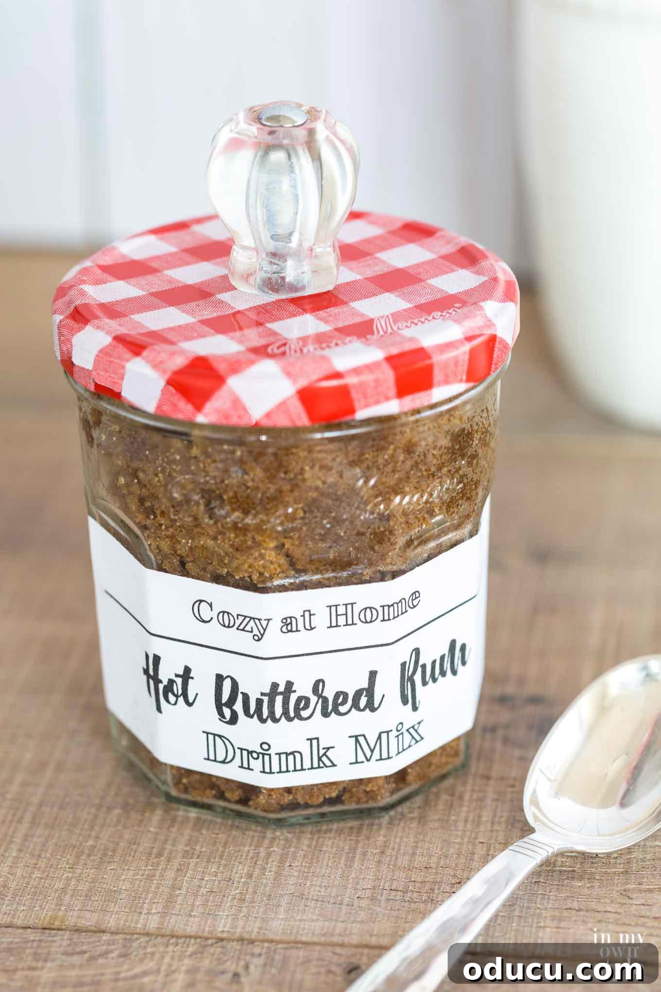 Buttered Rum Bliss: Cozy Evenings In 8 Hot Buttered Rum Drink mix recipe in a jar, ready for gifting.