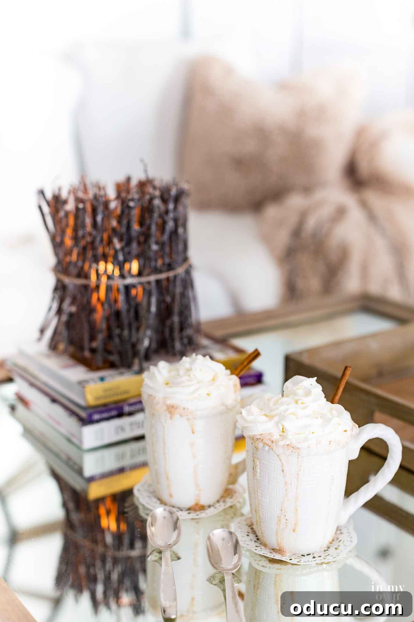 Buttered Rum Bliss: Cozy Evenings In 9 Enjoying a Hot Buttered Rum at home, illustrating the cozy Hygge lifestyle.