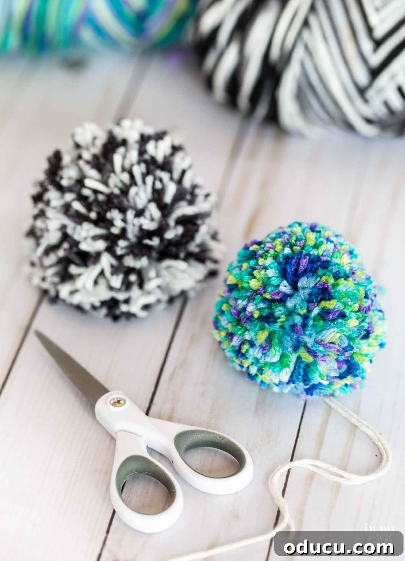 My Signature Pom Pom Basket 17 Close-up of handmade colorful yarn pom poms