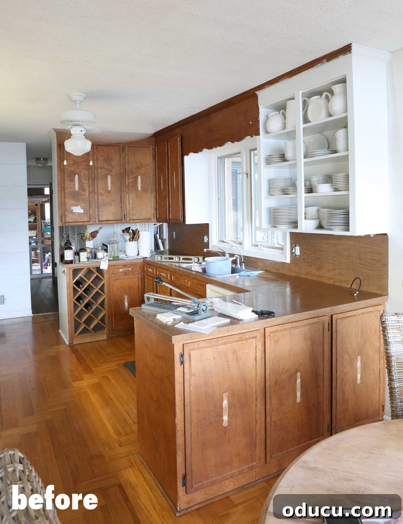 DIY-kitchen-makeover-on-a-budget while painting kitchen countertops