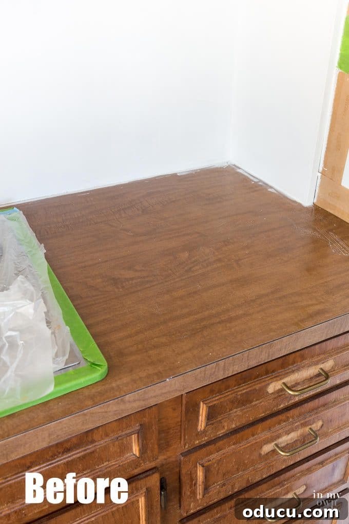 Painting kitchen countertops to look like Carrara Marble using Giani Countertop paint kit