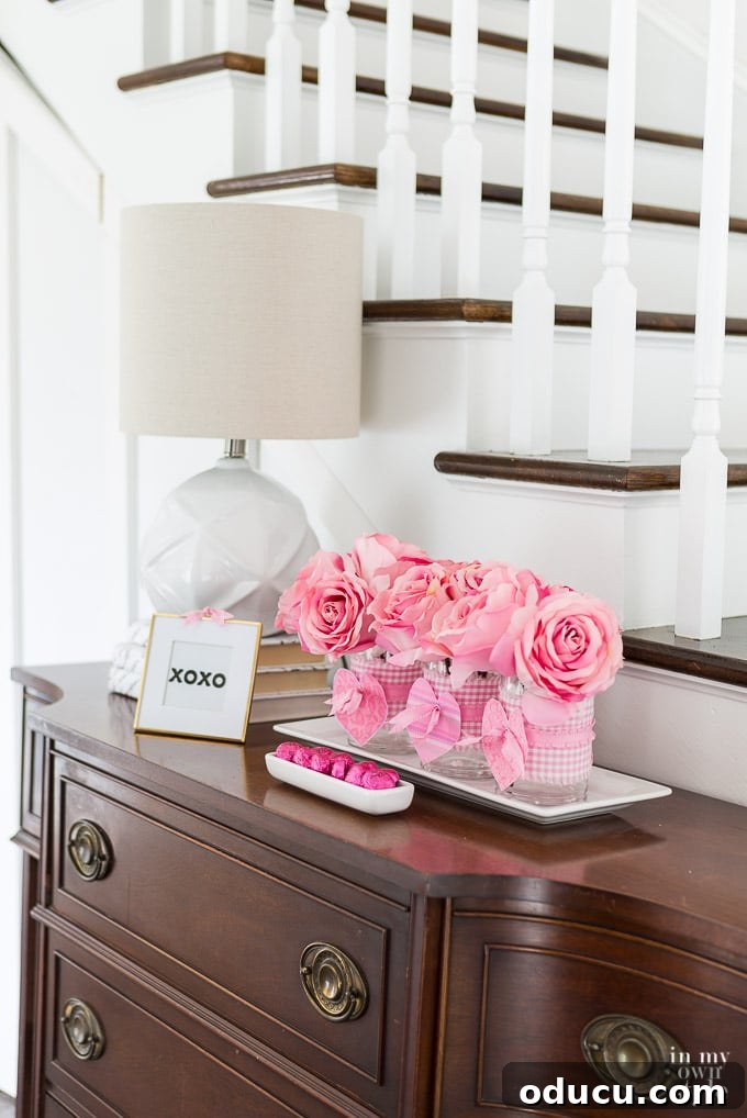 Valentine's Day Triple Vase Tray 2 Pink and white Valentine's Day flower vases arranged beautifully on a tray