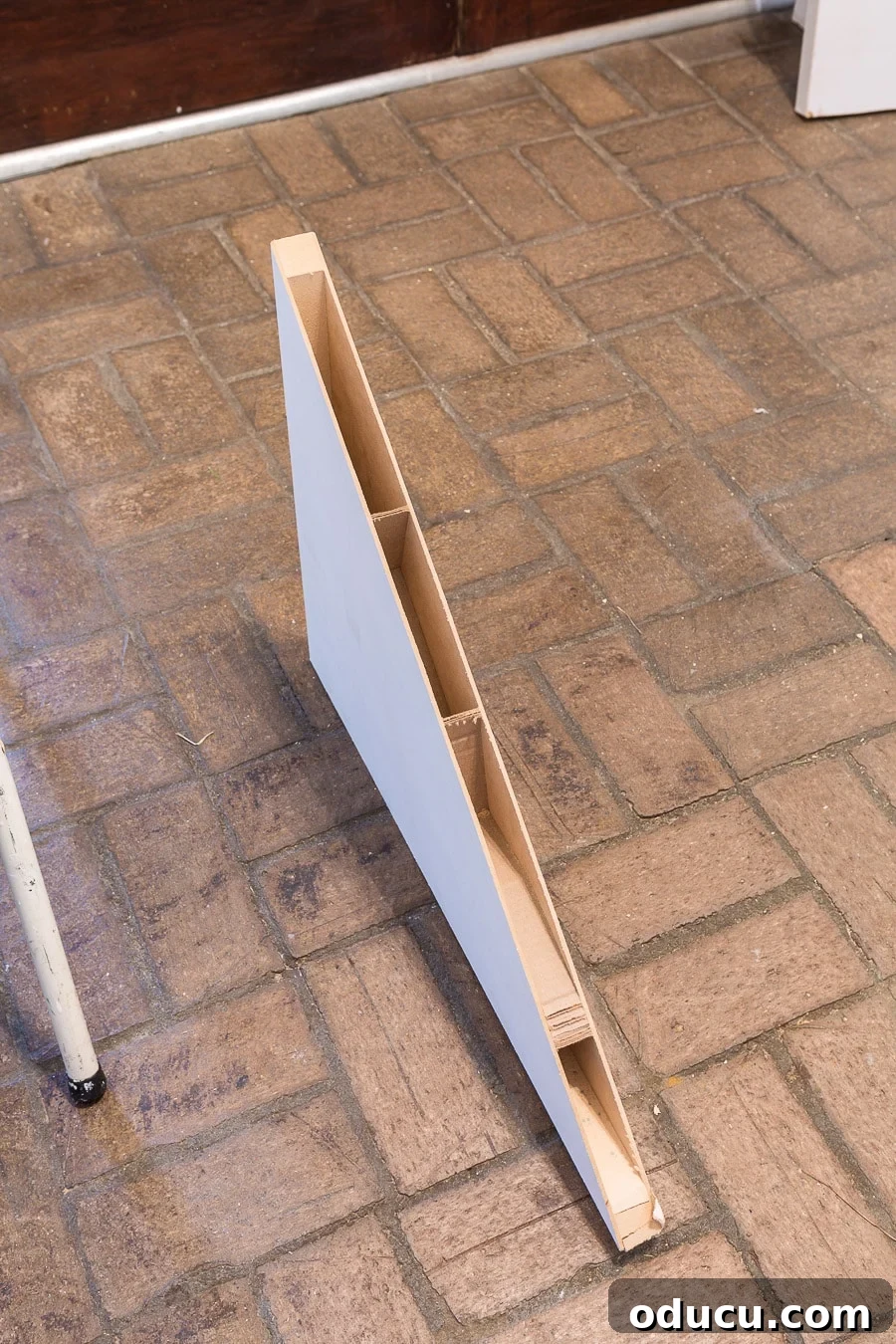 Transform Your Staircase into a Secret Storage Haven 13 How to make a hidden door using a hollow core door, showing the door installed in a basic frame.