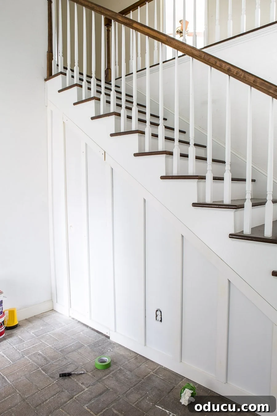 Transform Your Staircase into a Secret Storage Haven 25 Under a staircase home improvement projects, showing the finished construction ready for painting.