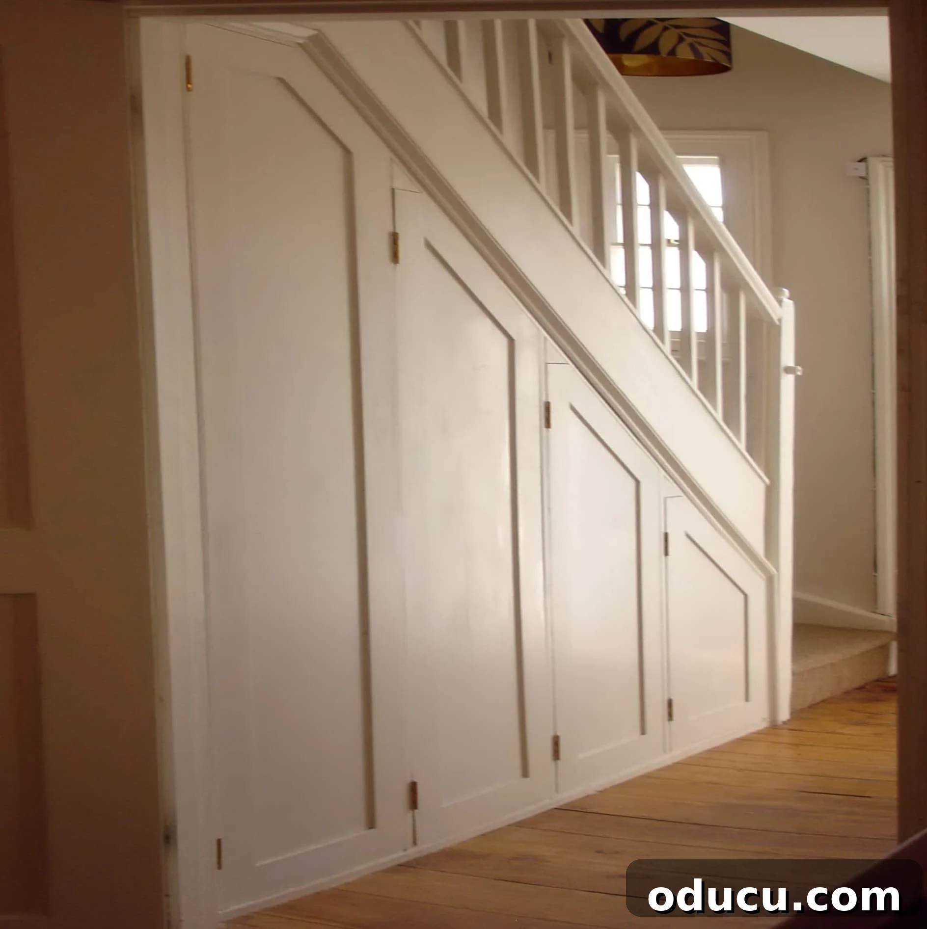 Transform Your Staircase into a Secret Storage Haven 5 How to build a closet under a staircase, showing the initial framing and planning.
