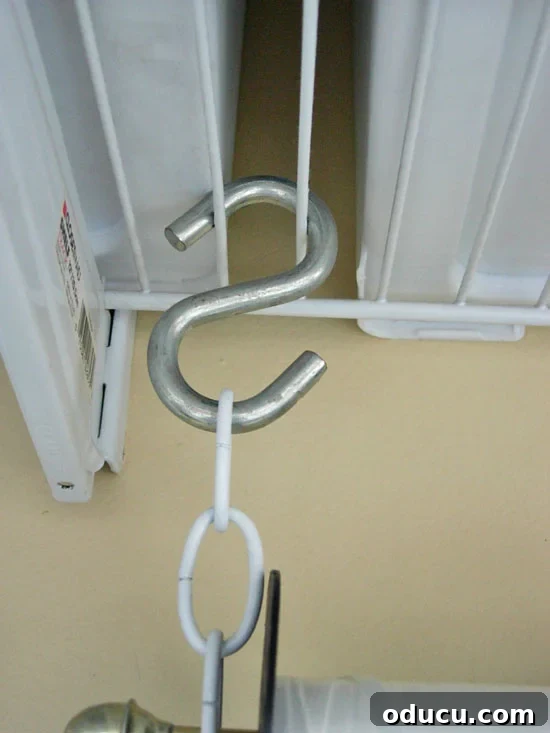 Conquer Ribbon Chaos: Genius Storage for Every Spool 17 S-hook and chain setup for ribbon holder