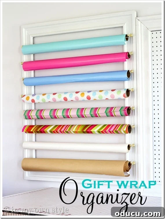 Conquer Ribbon Chaos: Genius Storage for Every Spool 21 DIY gift wrap or ribbon rolls organizer with a frame