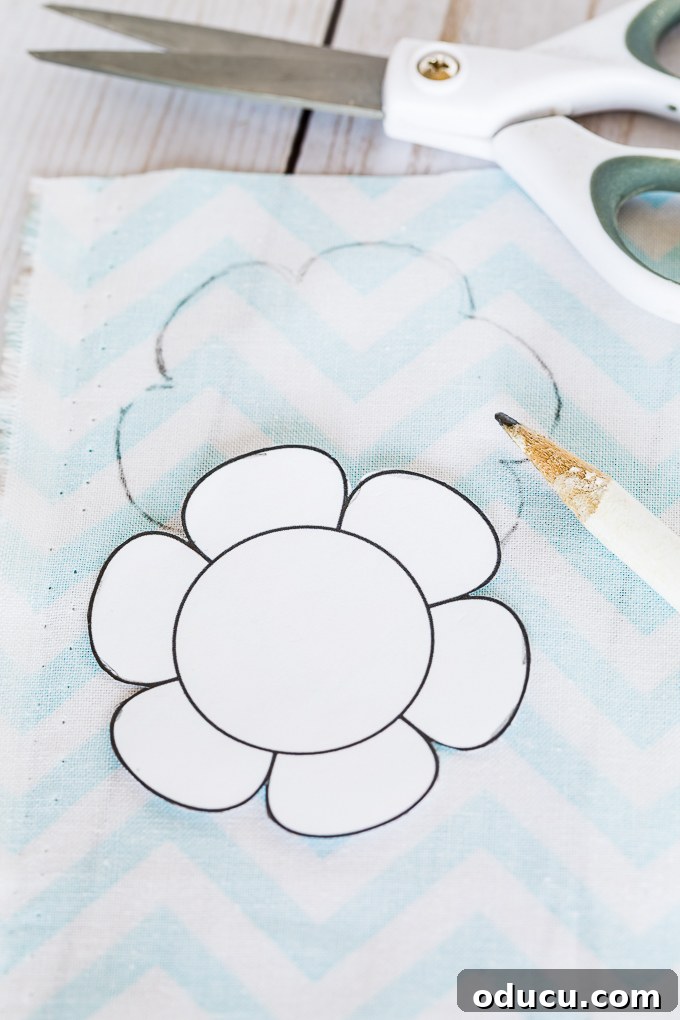 Revitalize Furniture with Fabric and Liquid Starch 21 How to make fabric rosette draw pulls for a girls bedroom: Tracing flower patterns on fabric.