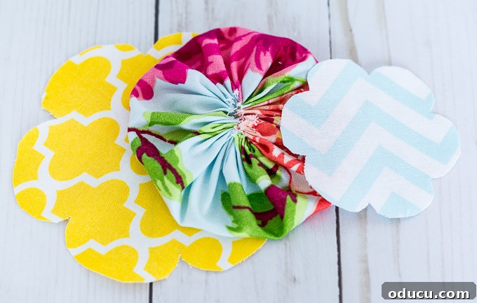Revitalize Furniture with Fabric and Liquid Starch 24 Furniture drawer pull ideas DIY: Assembling the fabric flower layers.