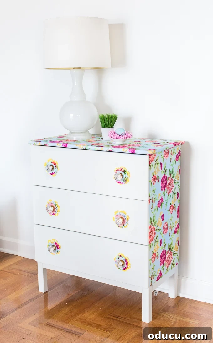 Revitalize Furniture with Fabric and Liquid Starch 7 Furniture makeover using liquid starch and fabric: Detail of the applied fabric on the dresser side.