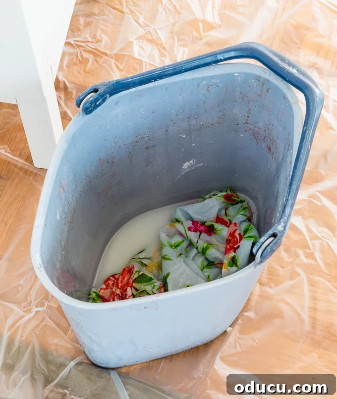 Revitalize Furniture with Fabric and Liquid Starch 10 Step by step Tutorial for Furniture Makeover Using Fabric + Liquid Starch: Preparing workspace with a drop cloth.