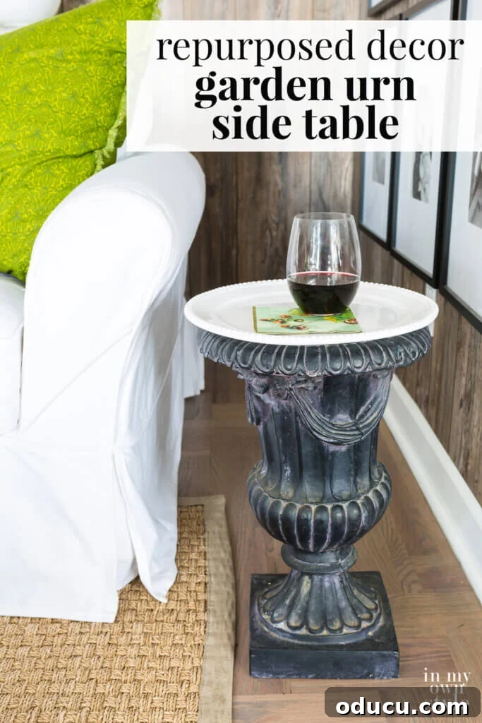 Transform an Old Urn into a Chic Side Table 8 Beautifully repurposed garden urn serving as an elegant end table in a living room, showcasing effective DIY home decor.