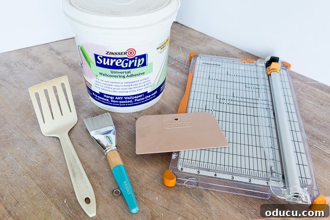 Globetrotting Laundry Room: DIY Map Wallpaper Project 14 supplies needed for DIY map wallpaper