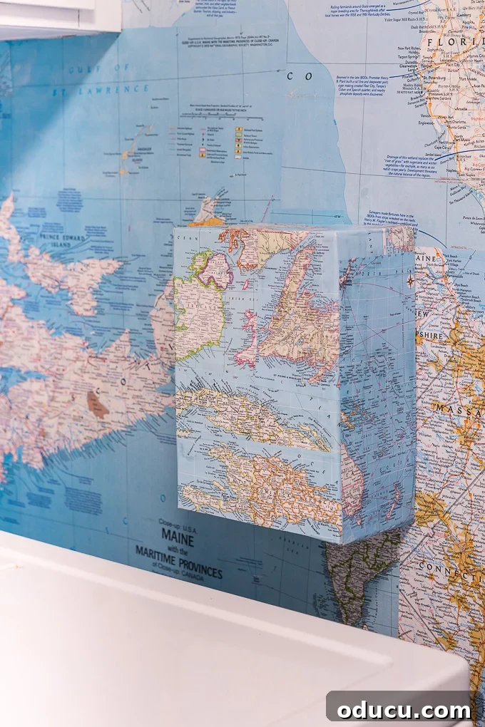 Globetrotting Laundry Room: DIY Map Wallpaper Project 33 How to hide a utility box on a wallpapered wall