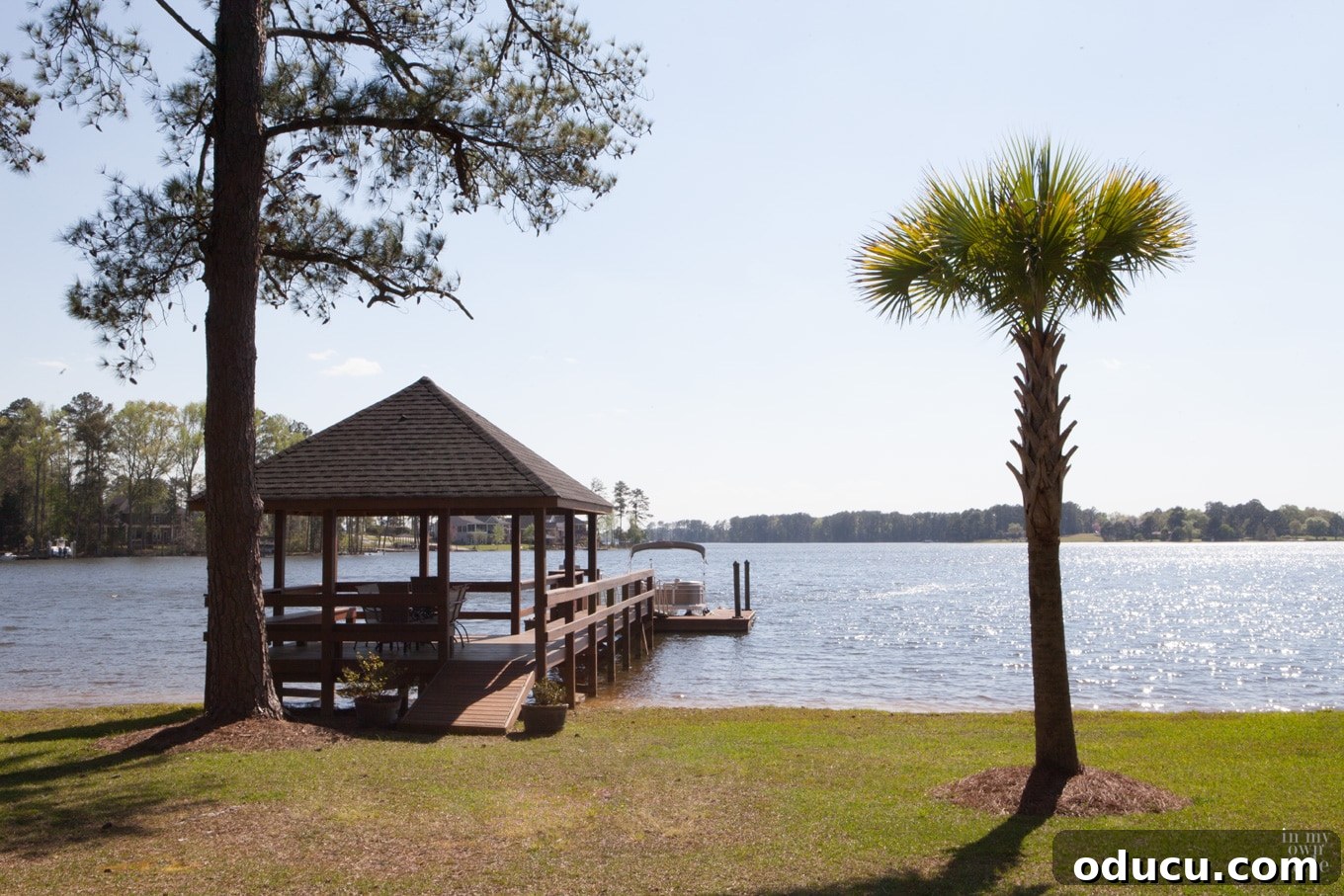 My Lakeside Haven 3 Serene lake house gazebo, decorated for outdoor living and entertaining, overlooking the water.