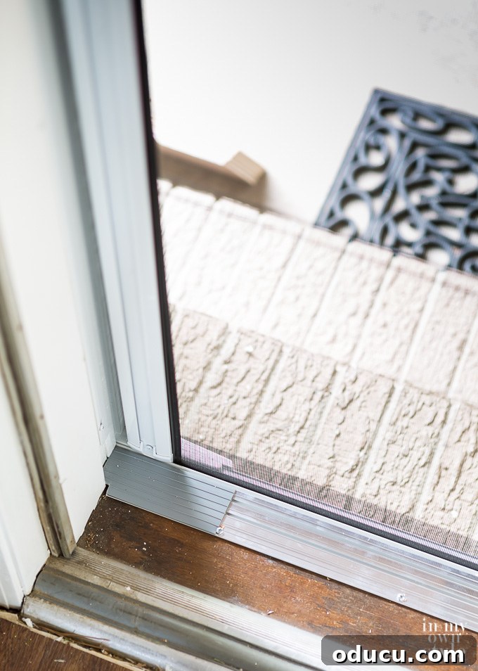 Homemade Screen Door Disaster 11 Customizing the bottom track pieces of the Brisa Retractable Screen Door.