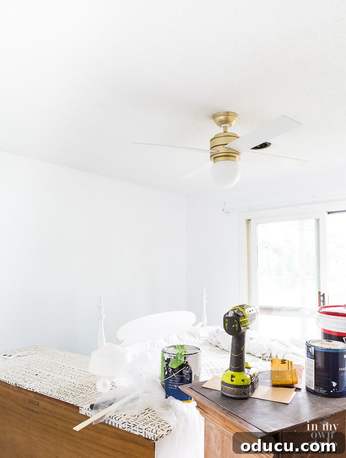 Guest Room Revamp in Motion 9 The newly installed Hunter Hepburn Ceiling Fan with white blades, completing the room's foundational updates