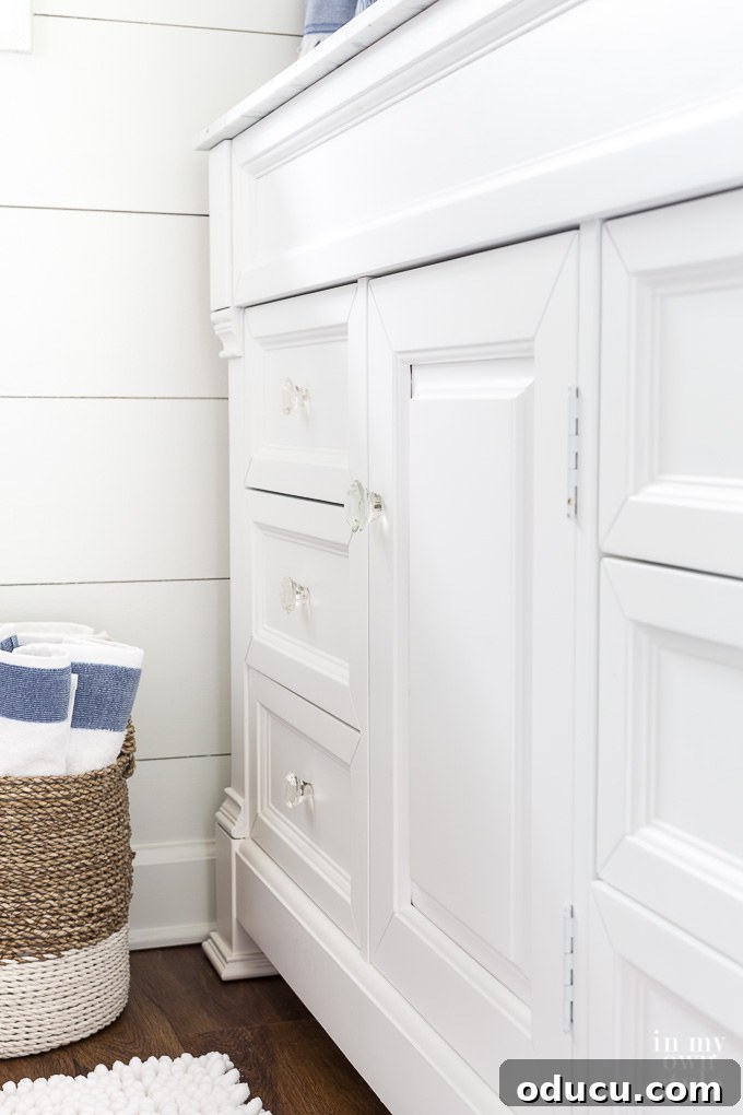 Bathroom makeover using a blue and white color scheme Bathroom makeover using a blue and white color scheme