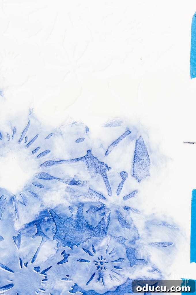 Achieve the Faux Wallpaper Look with Paint and Stencils 14 Moving the stencil to the next position using registration marks for a continuous pattern