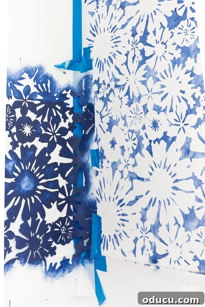 Achieve the Faux Wallpaper Look with Paint and Stencils 17 Bending and securing the stencil into a wall corner for painting