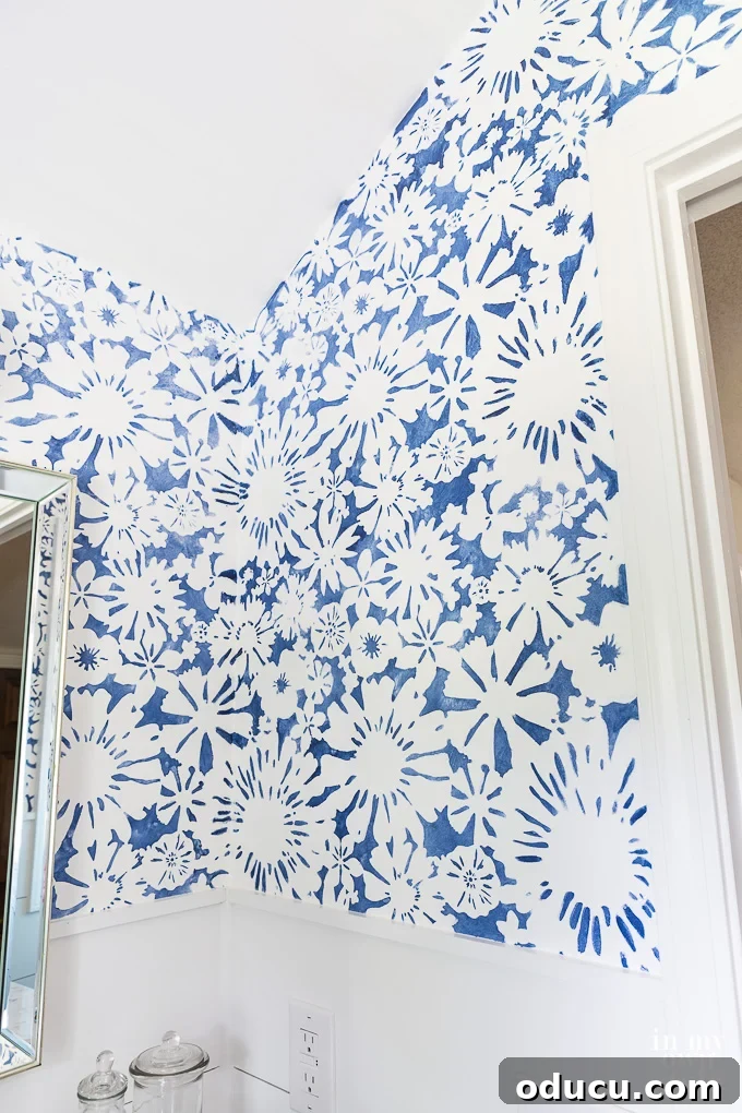 Achieve the Faux Wallpaper Look with Paint and Stencils 5 Finished guest bathroom with elegant faux wallpaper, enhancing the room's character