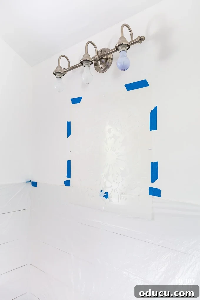 Achieve the Faux Wallpaper Look with Paint and Stencils 10 Setting up the first stencil placement for a wall design