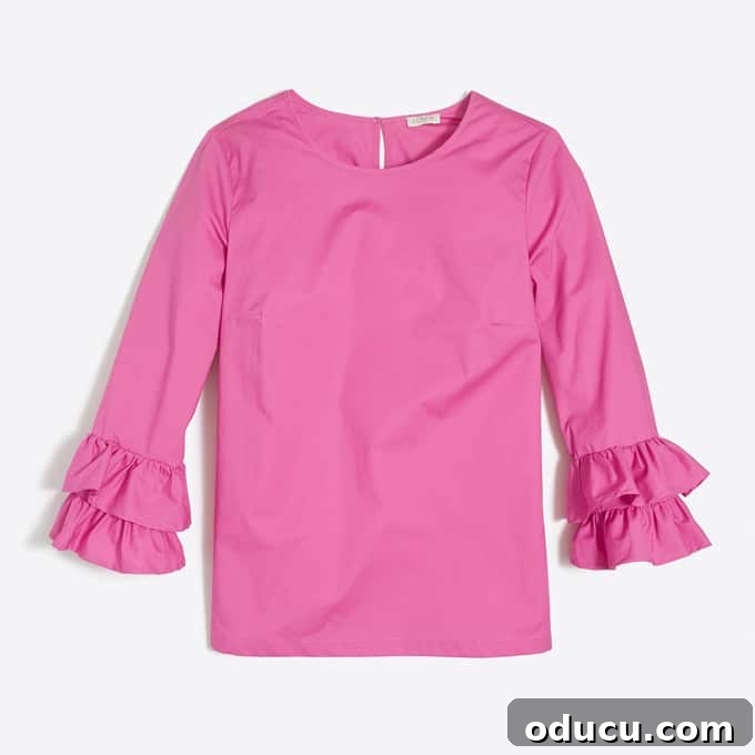 Wanderlust and Wardrobes 7 Stylish pink double ruffle sleeve top from J. Crew Factory, perfect for a chic and comfortable autumn look.