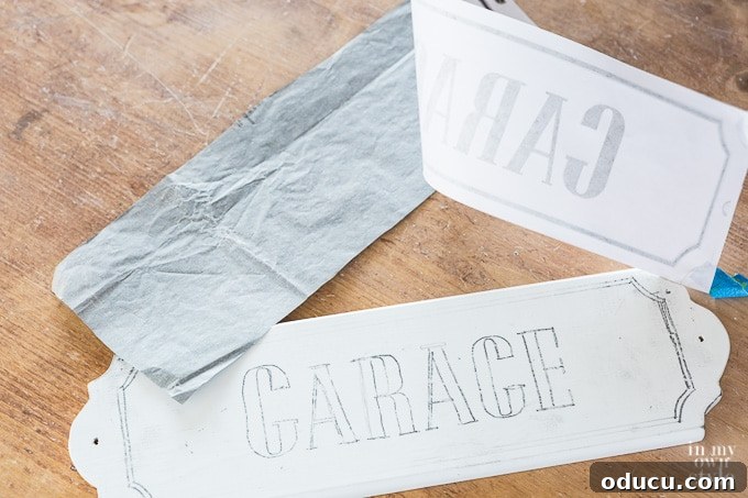 Chic French Inspired Door Plaques 13 Using graphite paper to transfer lettering to wood sign