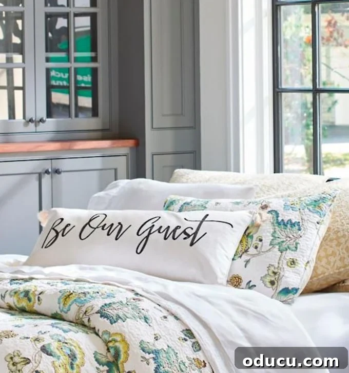 Craft a Custom Pom Pom Pillow 3 Grandin-Road-catalog Be-Our-Guest-Pillow
