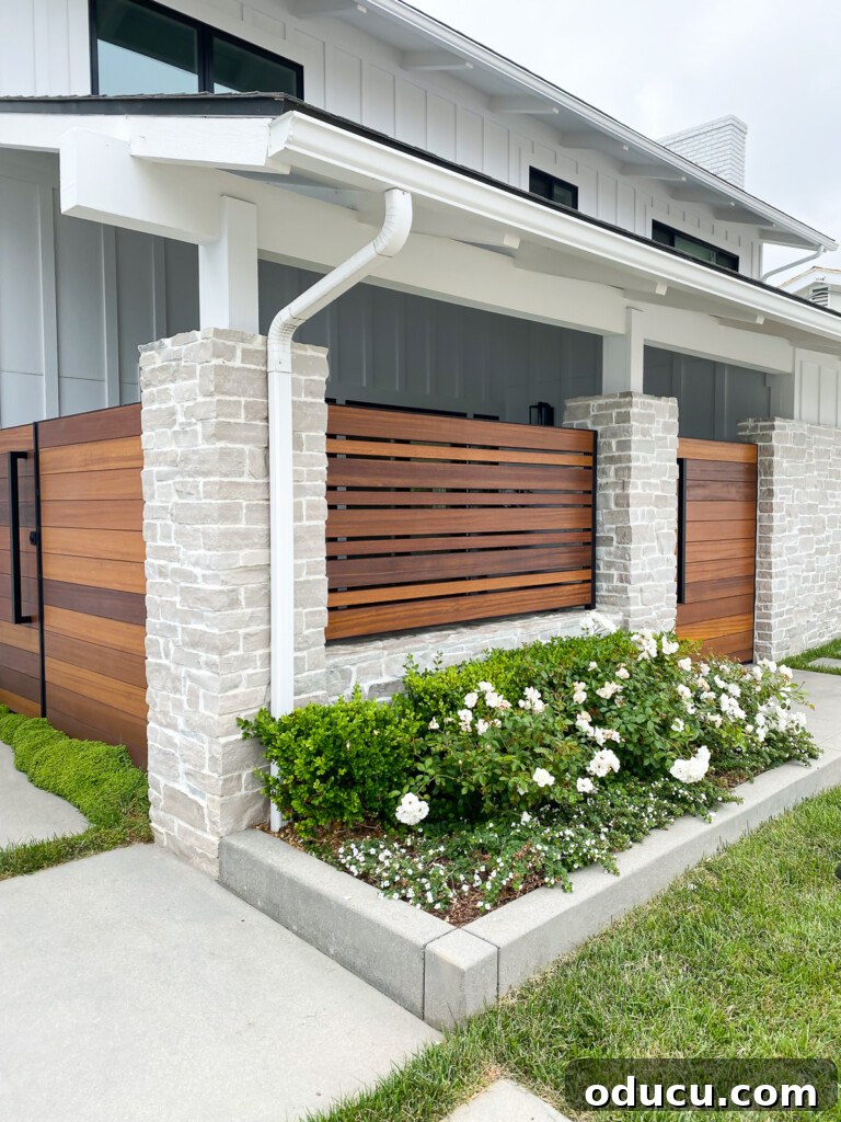 Make The Most Of September 17 A modern house featuring a slat wall enclosure, offering ideas for architectural details or screening.