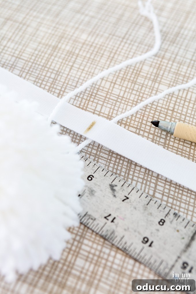 Stylish Ottoman Slipcover with Detachable Pom Pom Accent 18 Visual guide: how to use Velcro to attach pom pom trim to a cover for an ottoman