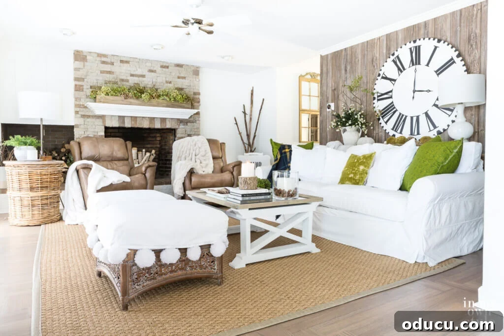Recliner Chic: Elevating Your Living Room's Style 4 Autumn decorated living room using items from nature to create a white and woodsy look.