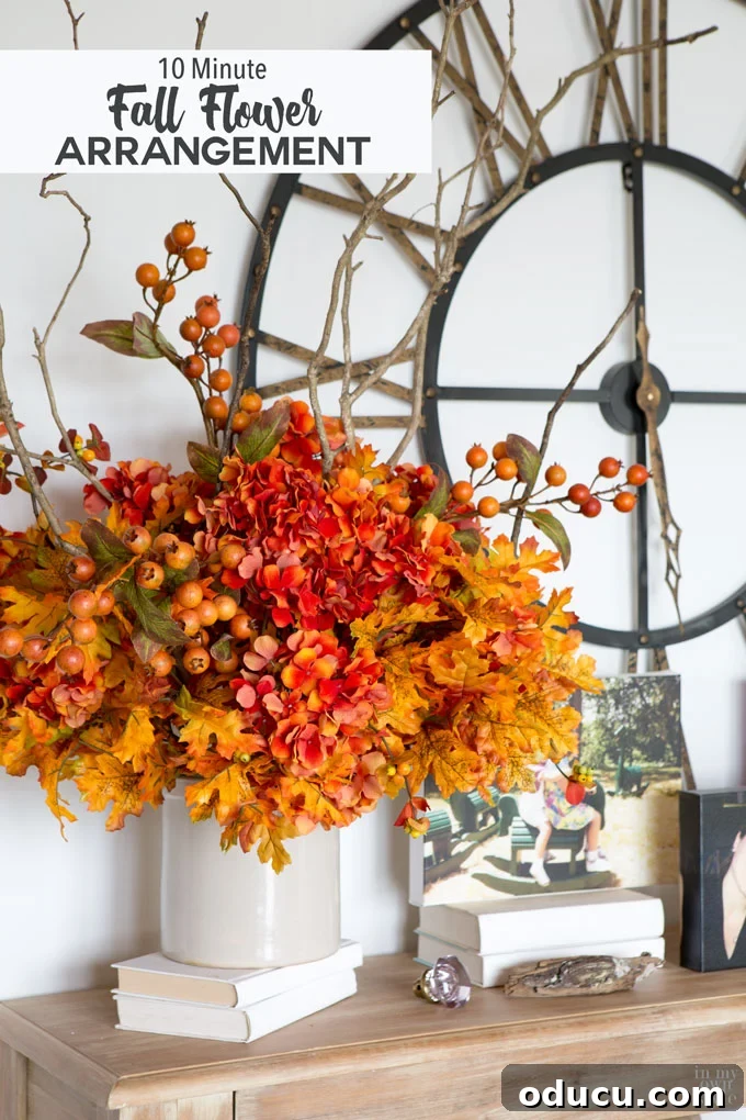 Effortless Autumn Centerpiece 13 Overall view of a beautiful, easy-to-make faux fall flower arrangement, created with yard branches and craft store florals, demonstrating professional-looking results without a florist