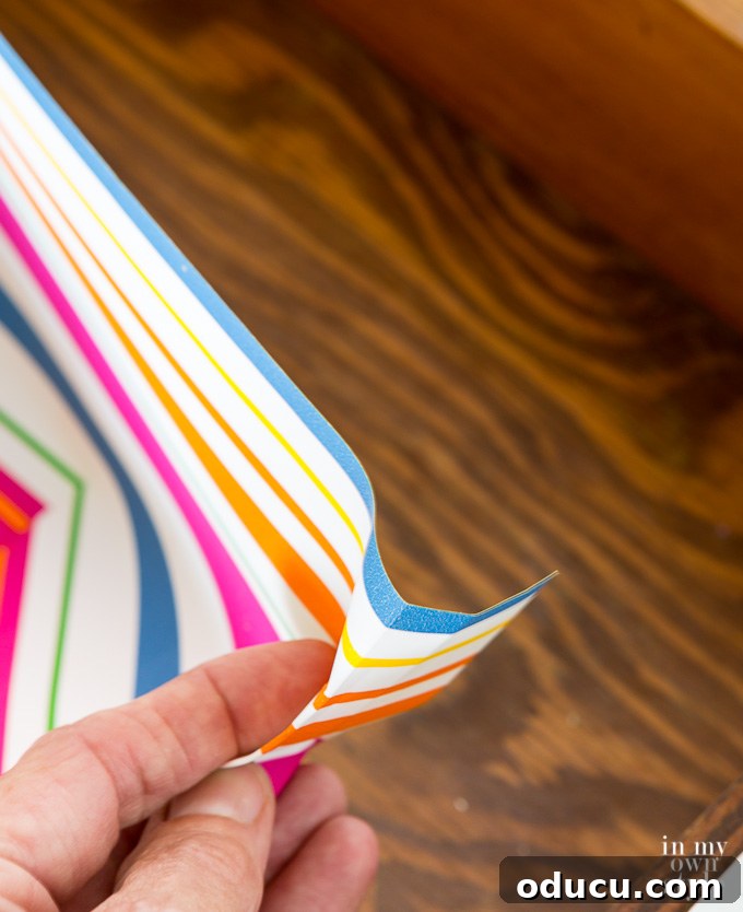 Cutting along the creased line for a perfect fit how to fit drawer liners into drawers without the need to measure