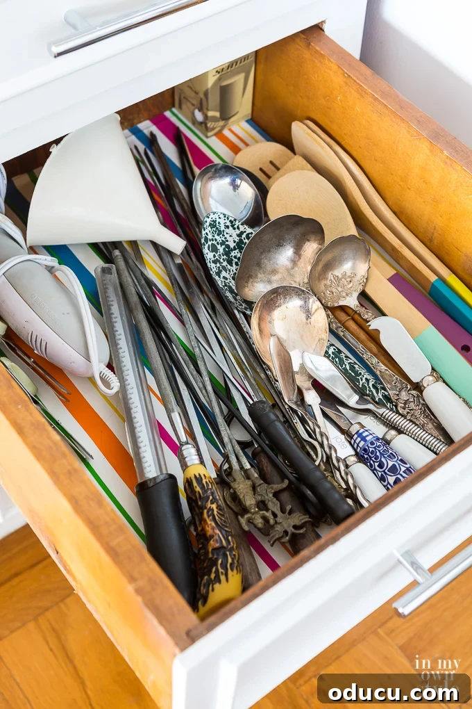 Organized kitchen drawer with new liner and dividers kitchen drawer organizing