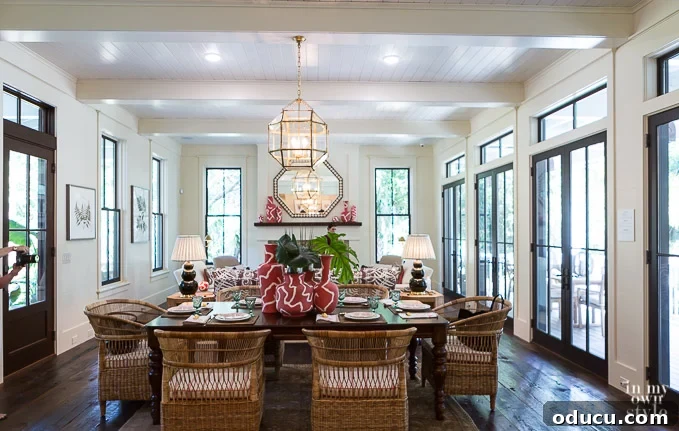 Design Dreams Unveiled at the Southern Living Idea House 15 Bright and airy living room with ample natural light and large windows at the Southern Living Idea House