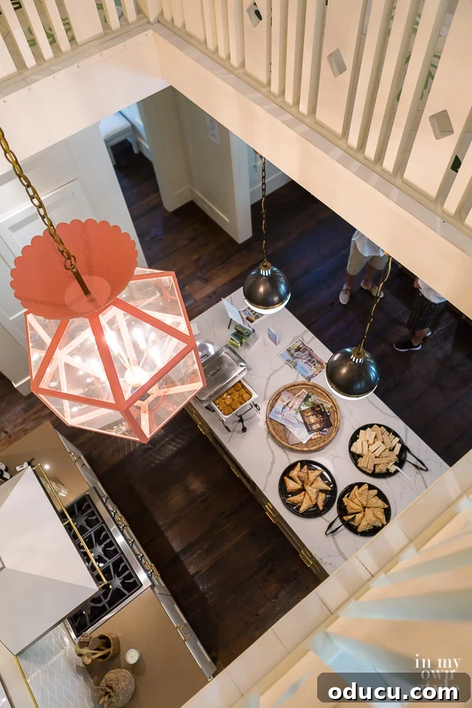 Design Dreams Unveiled at the Southern Living Idea House 28 View looking down into the kitchen from the second floor of the Southern Living Idea House on Bald Head Island