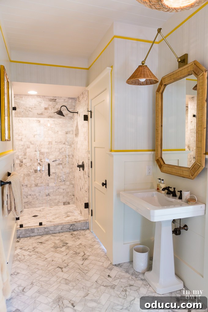 Design Dreams Unveiled at the Southern Living Idea House 37 Decorating with grosgrain ribbon in a bathroom at the Southern Living Idea House, adding a pop of color