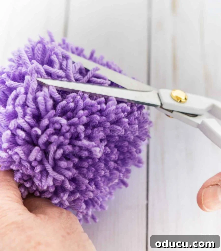 Craft Your Own Tassels: Elevate Your Home Decor 28 How to make a yarn pom pom