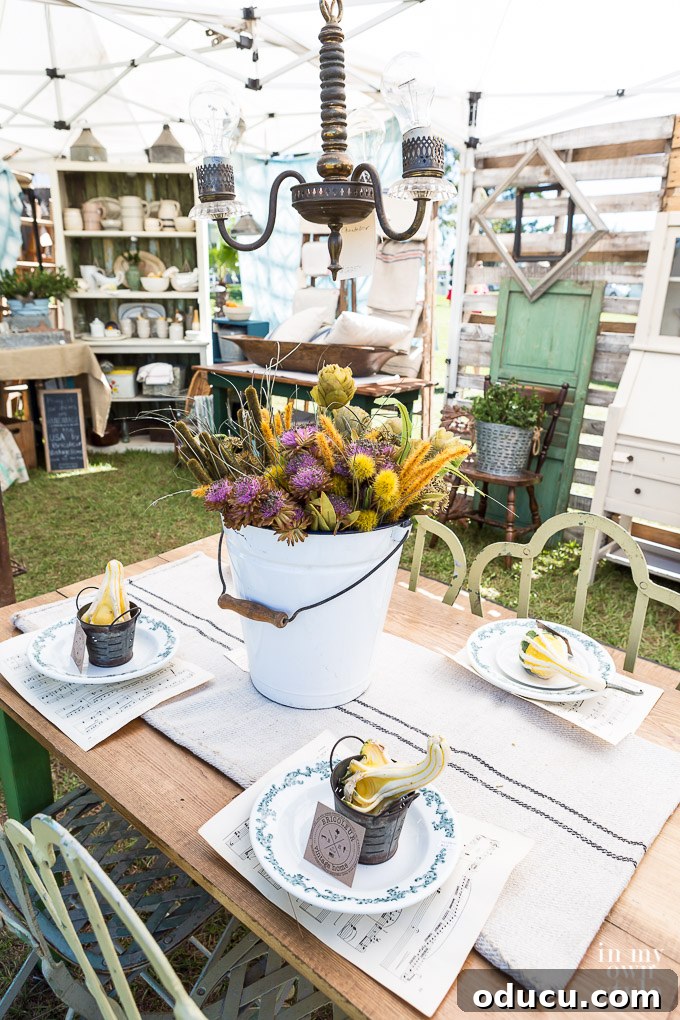 Rustic Riches: A French Flea Market Chronicle 9 Bricoleur Vintage Home tent and displays at the flea market with home decor items