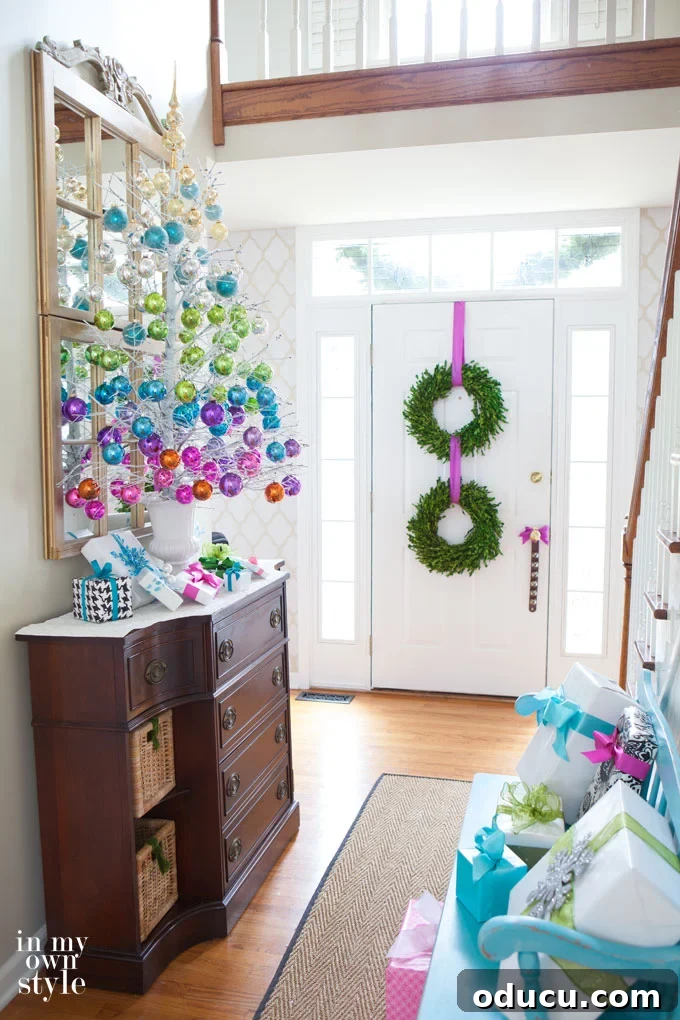 Craft Your Own Christmas Magic 15 Foyer ideas for Christmas Decor with a painted dead tree