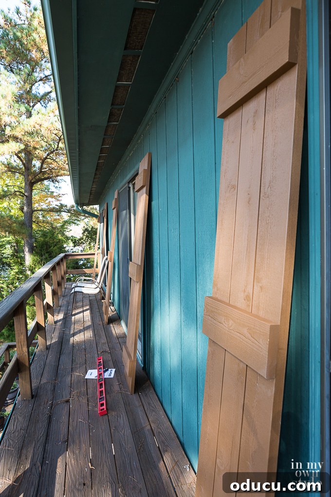 Elevate Your Curb Appeal Nu-Wood Exterior Makeover 11 Close-up of newly installed Nu-Wood shutters on a home exterior