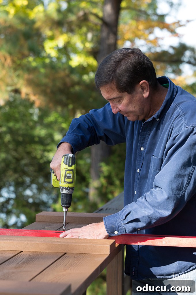 Elevate Your Curb Appeal Nu-Wood Exterior Makeover 13 Drilling counter-sunk holes in Nu-Wood shutters for installation